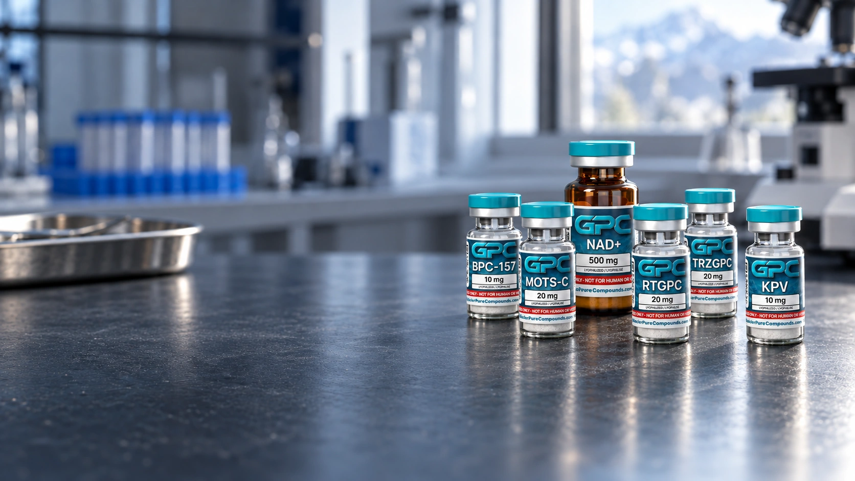 Six GPC research vials, including BPC-157 10 mg, MOTS-C 20 mg, NAD+ 500 mg, Retatrutide 20 mg, Tirzepatide 20 mg and KPV 10 mg, grouped on a laboratory bench.